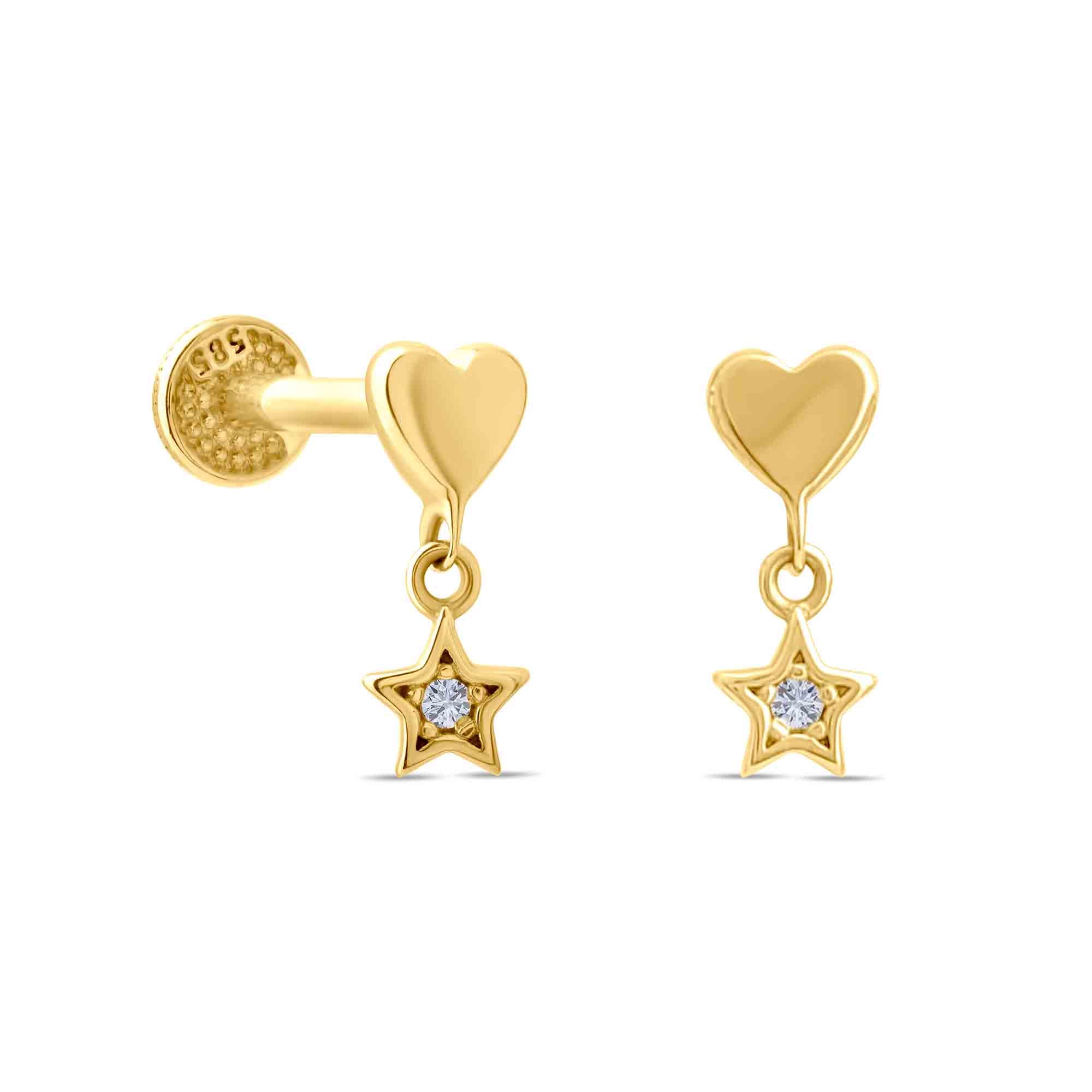 Gold heart and star piercings with clear gemstones on a white background