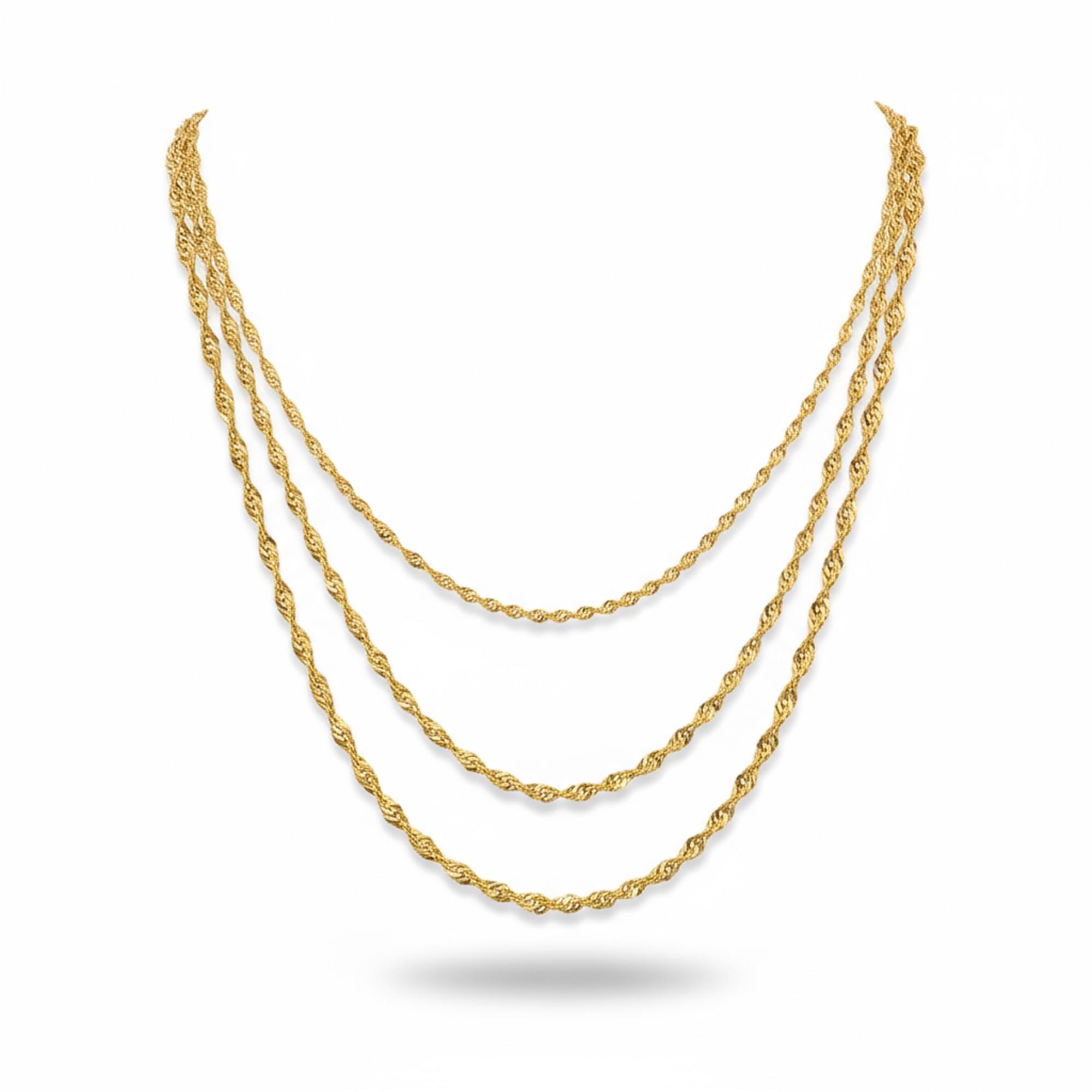 Three Singapore chain gold necklaces on a white background