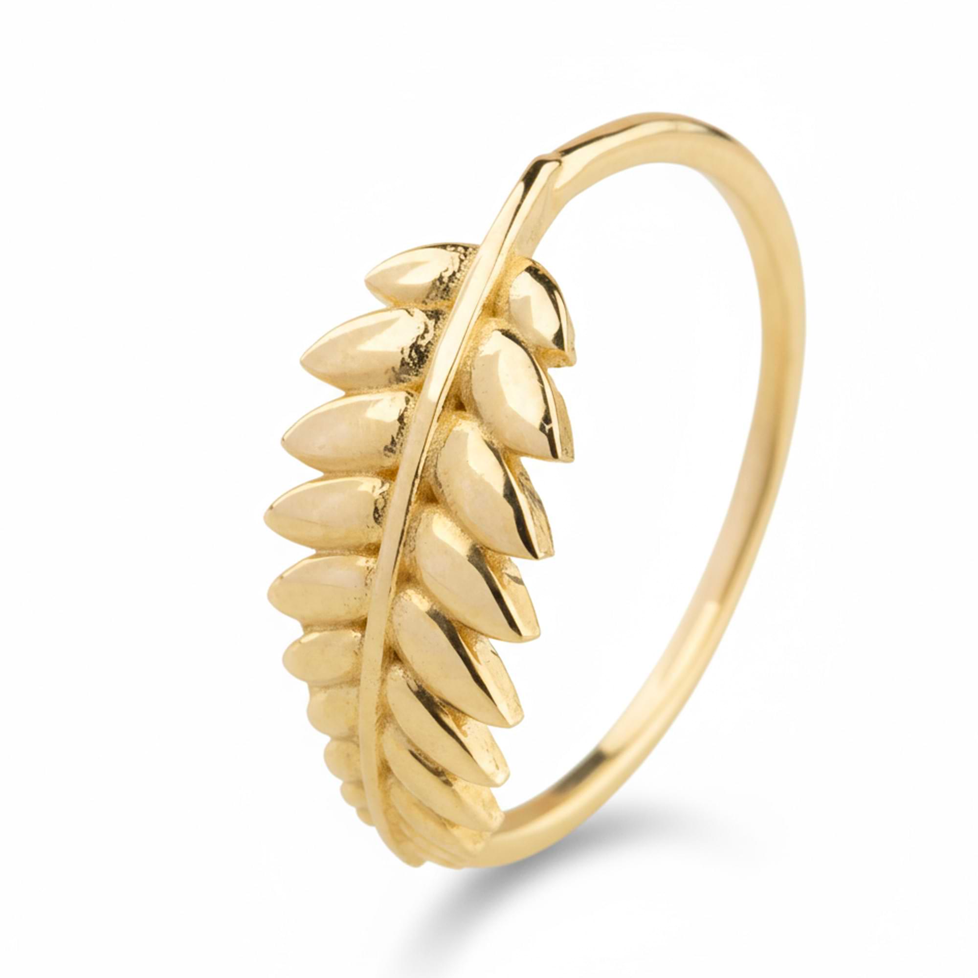 14k Gold ring with spiky design on a white background