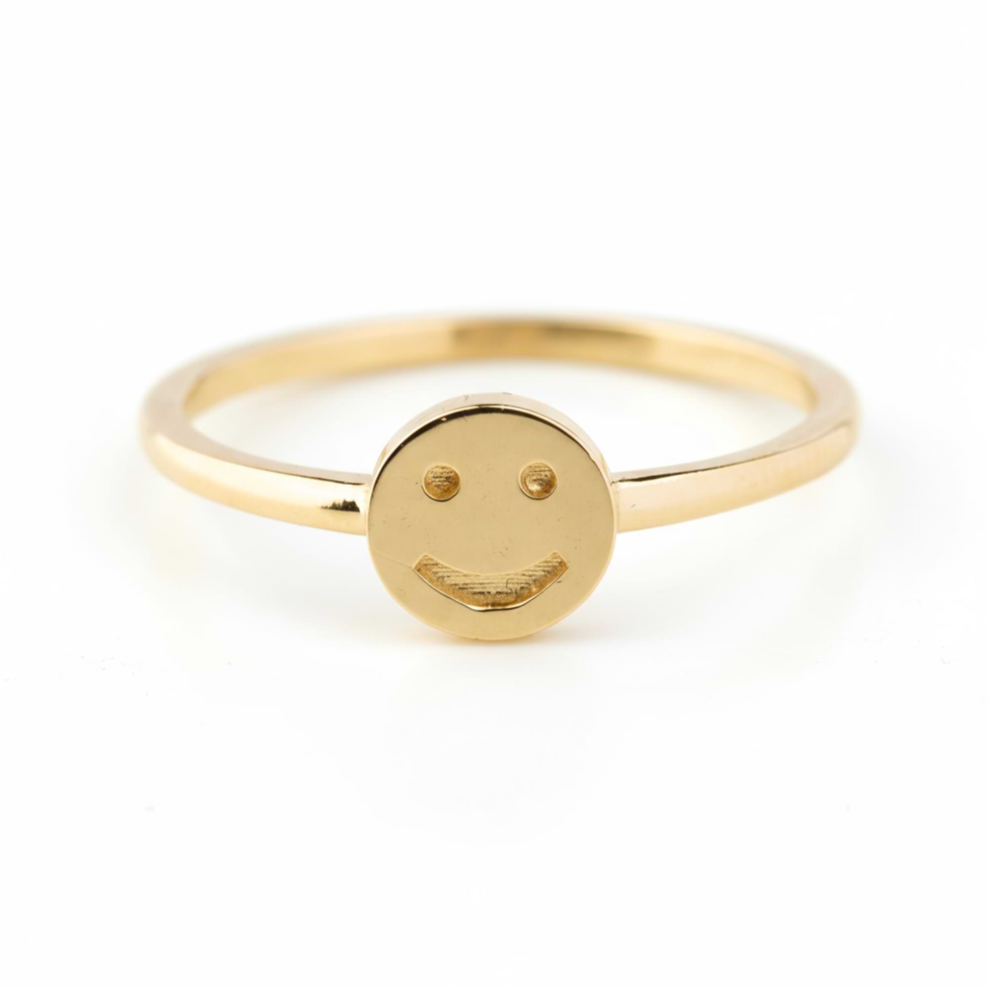 14k Gold ring with a smiley face design on a white background