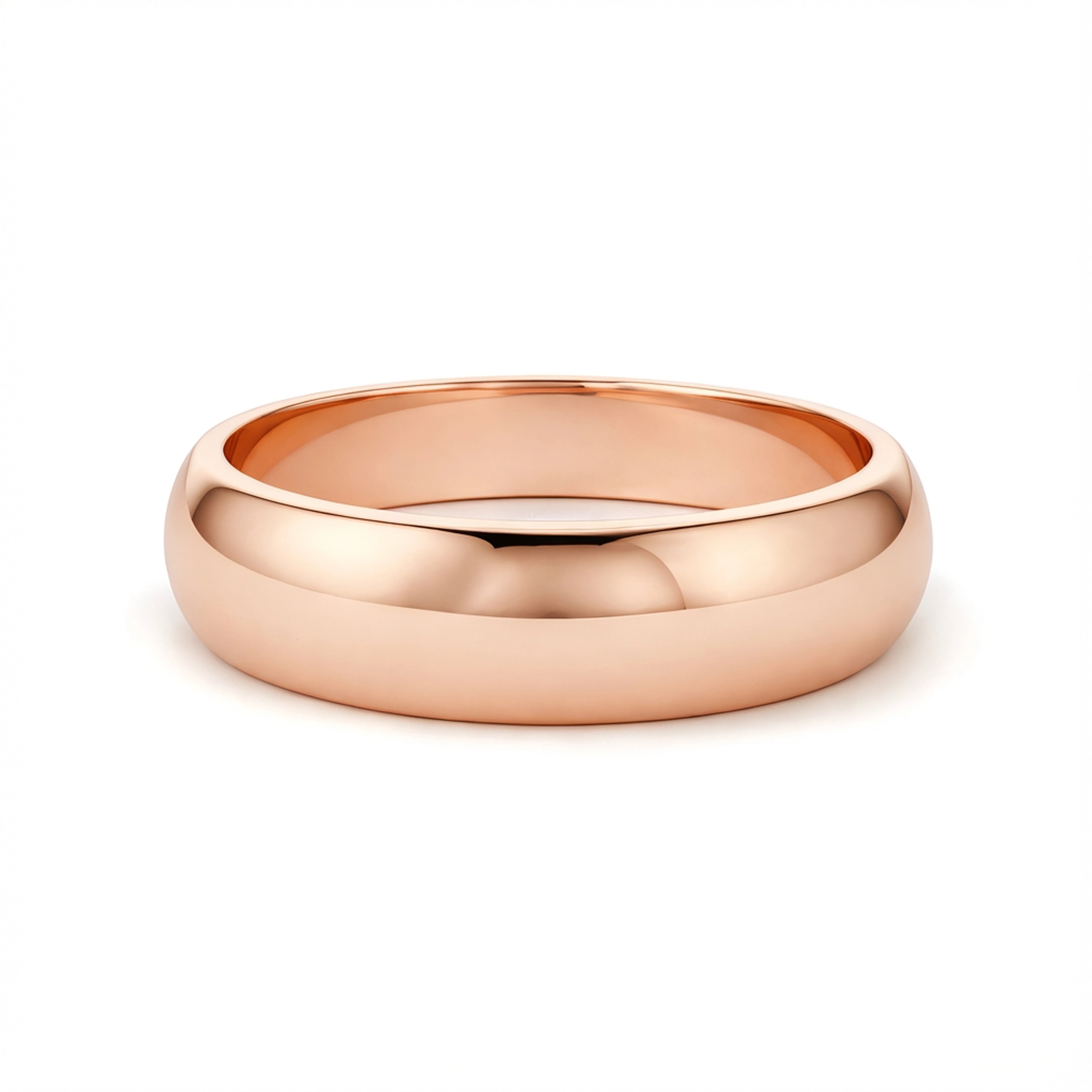 Rose gold ring on a white background